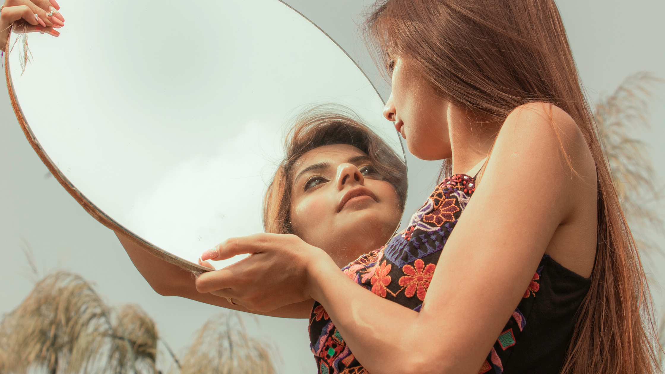 girl looking in mirror